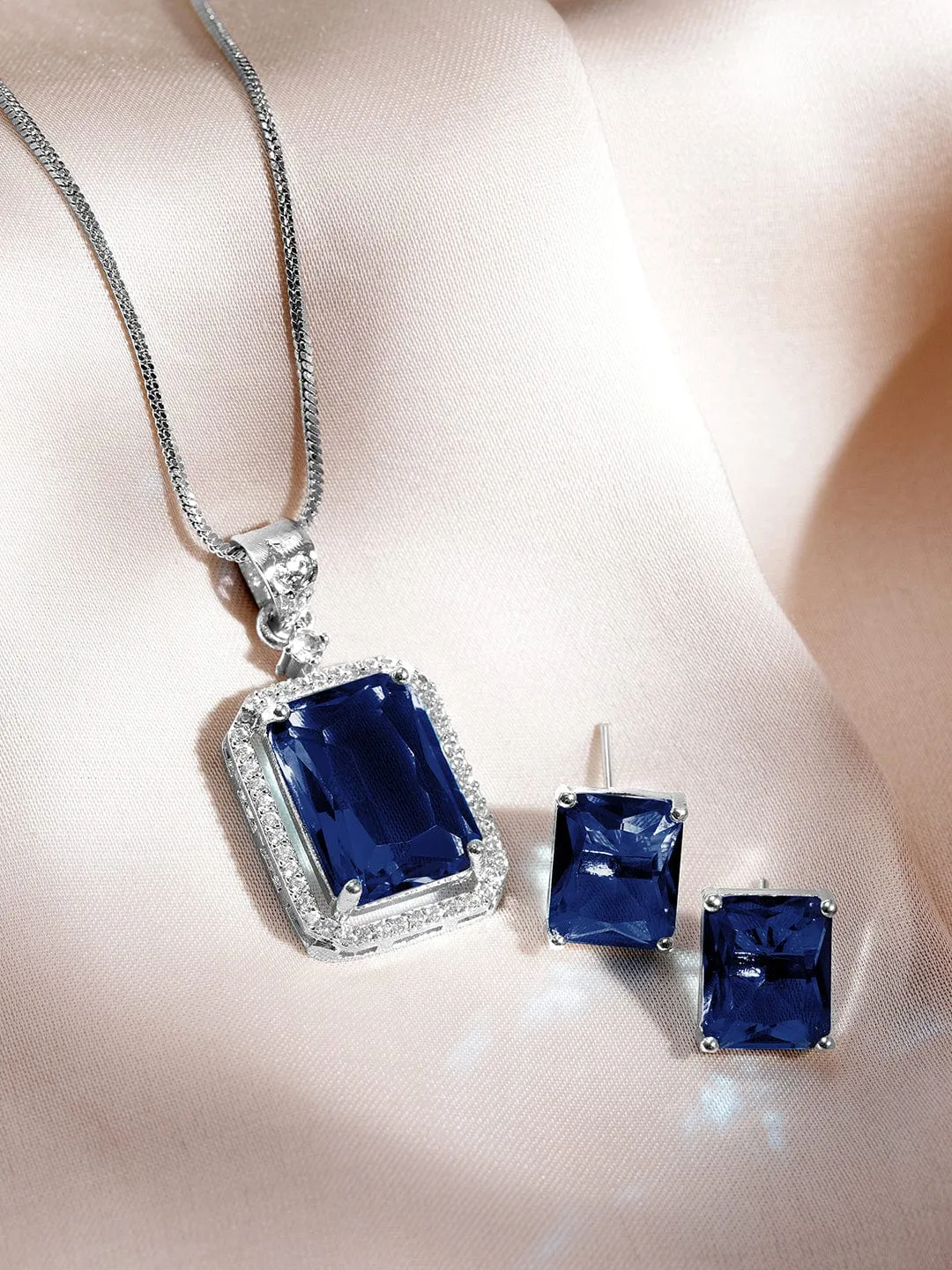 Luxurious Rhodium-Plated Blue Sapphire & CZ Studded Pendant Necklace Set