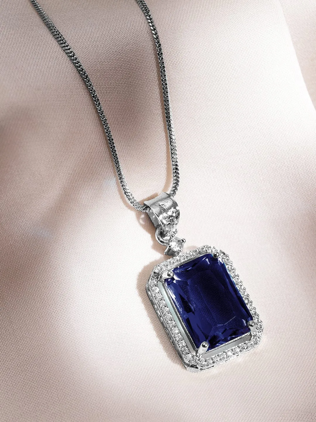 Luxurious Rhodium-Plated Blue Sapphire & CZ Studded Pendant Necklace Set